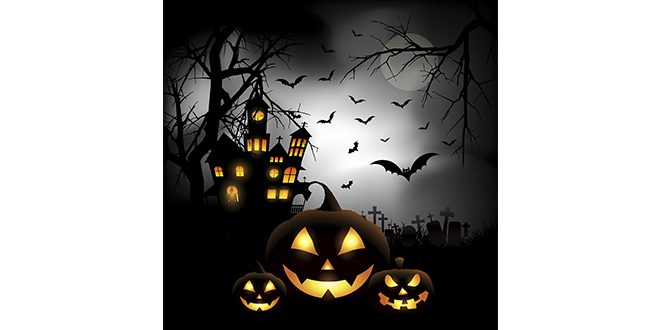 Spooky halloween background with pumpkins in a cemetery