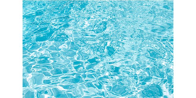 Blue swimming pool rippled water detail Photo